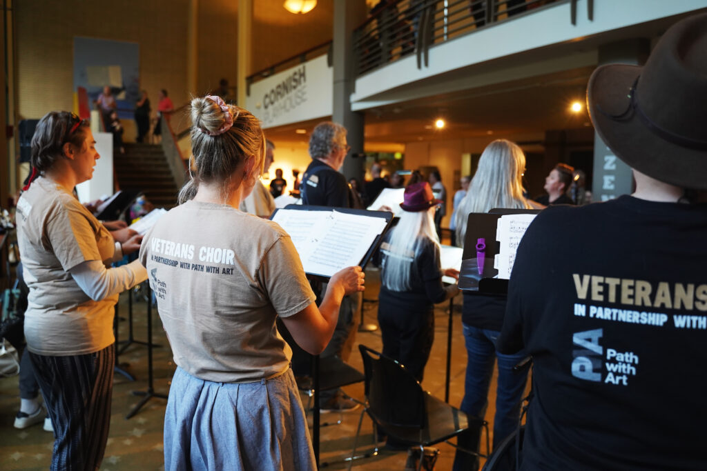 PwA Veterans Choir sings at the first annual Radiate! Community Festival at Cornish Playhouse.