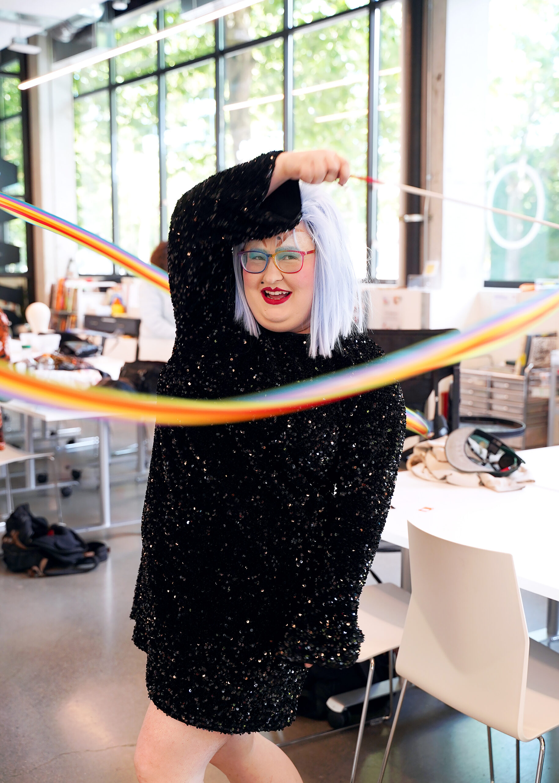 A Participant Artist twirls a colorful ribbon during Drag Camp class at the artHOME.