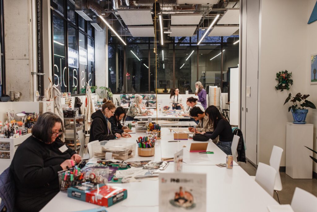 Participants and guests working in the artHOME studios