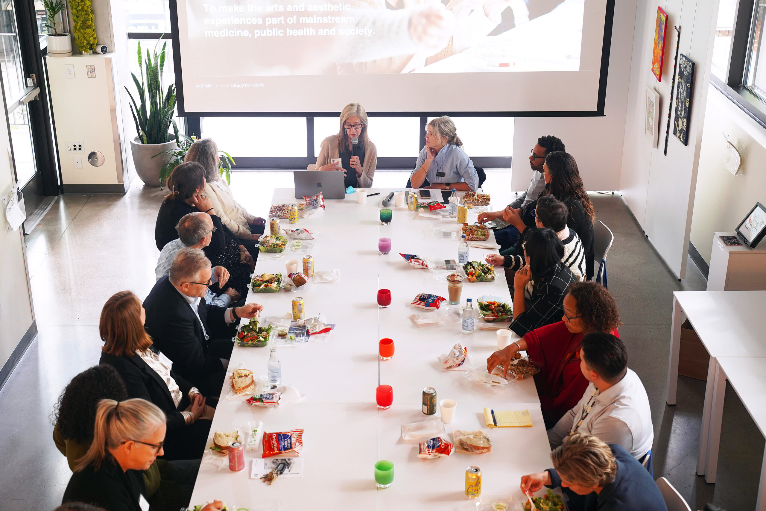 people sitting around a conference table