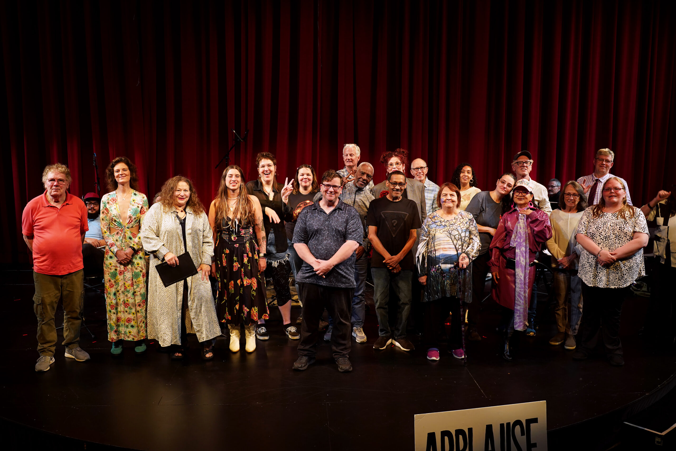 Path with Art certificate holders stand on a stage at the 2025 award ceremony, smiling