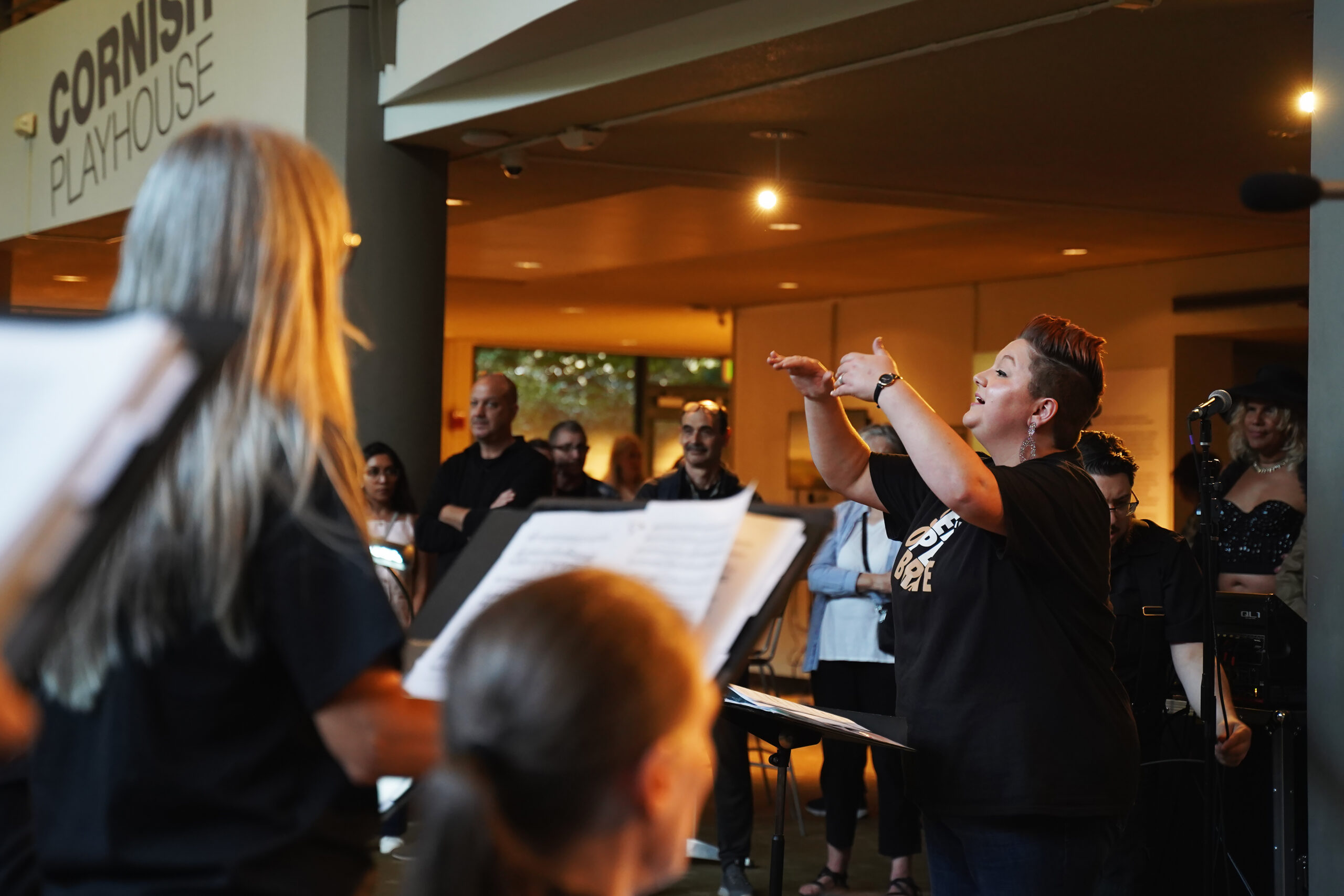 A Teaching Artist from Seattle Opera conducts the PwA Veterans Choir.