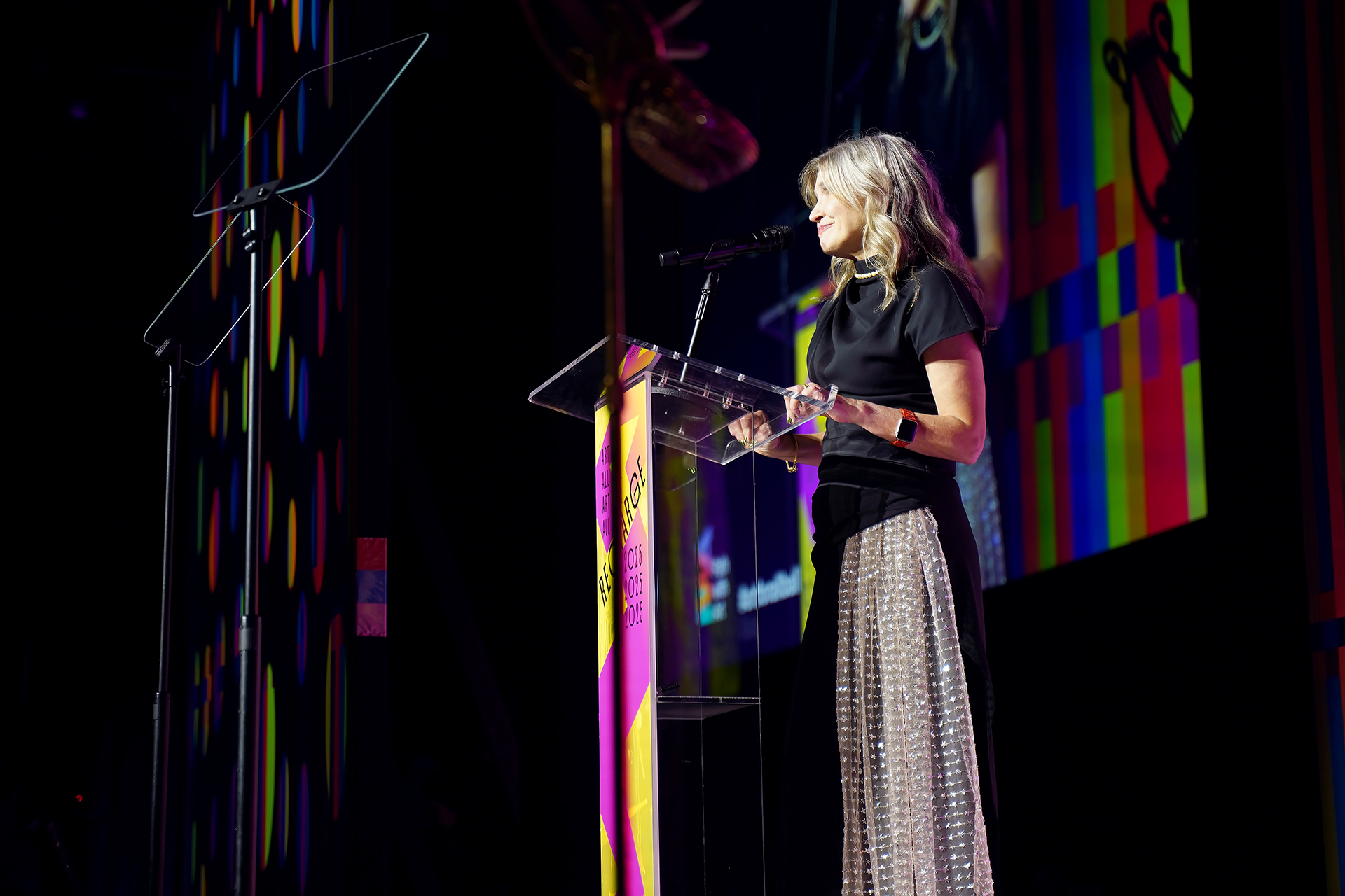 Path with Art CEO Holly Jacobson addresses attendees at the 2025 Art for All Ball.