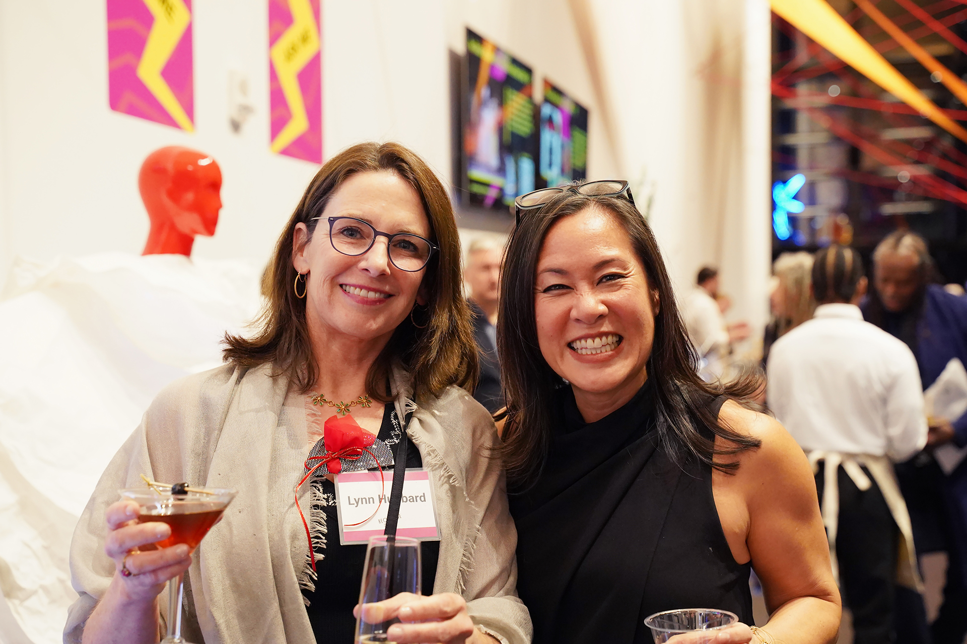 Supporters and models Lynn Hubbard and Katherine Cheng enjoy pre-event cocktails.