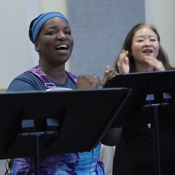 two women singing